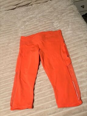 Lululemon orange cropped tights
